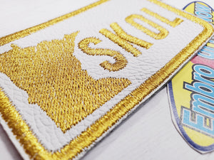 MN Skol  3" X 2" white italian  leather gold embroidery Patch